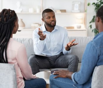 bigstock-Family-Psychotherapy-African-395951597