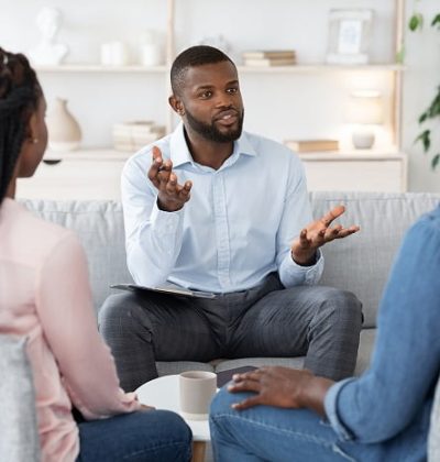 bigstock-Family-Psychotherapy-African-395951597